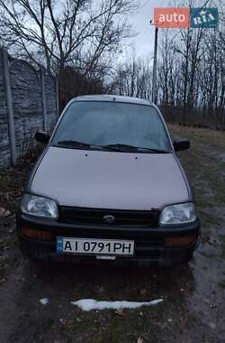 Хэтчбек Daihatsu Cuore 1997 в Гатном