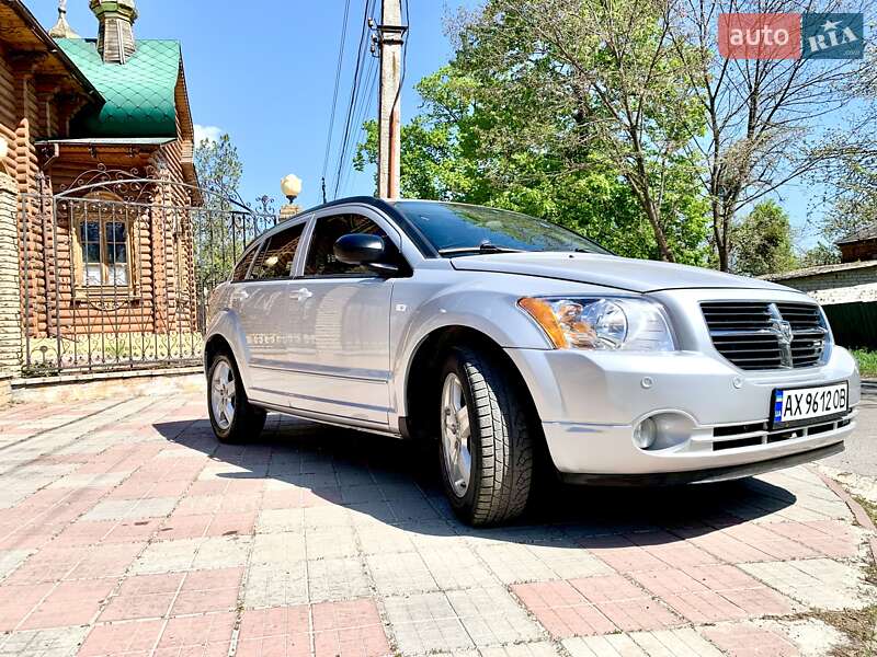 2008 Dodge Caliber, VIN 1B3HBG8B58D598426:plate — фото 1 (autoria)