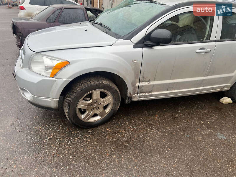 2008 Dodge Caliber, VIN 1B3HBG8B28D605218:plate — фото 1 (autoria)