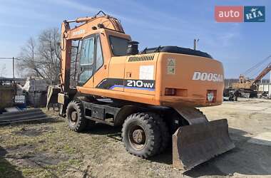 Экскаватор погрузчик Doosan Solar 210 2008 в 