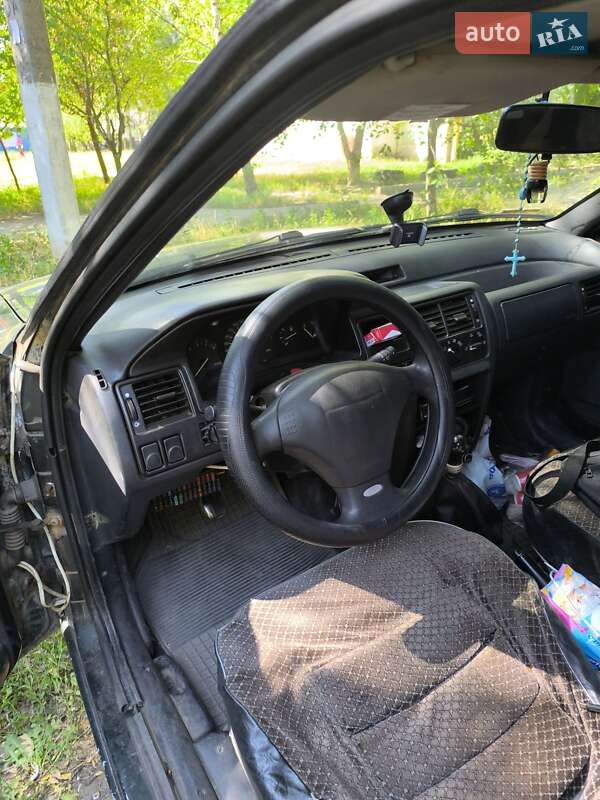 Хэтчбек Ford Escort 1993 в Чугуеве фото 2 Хэтчбек Ford Escort 1993 в Чугуеве