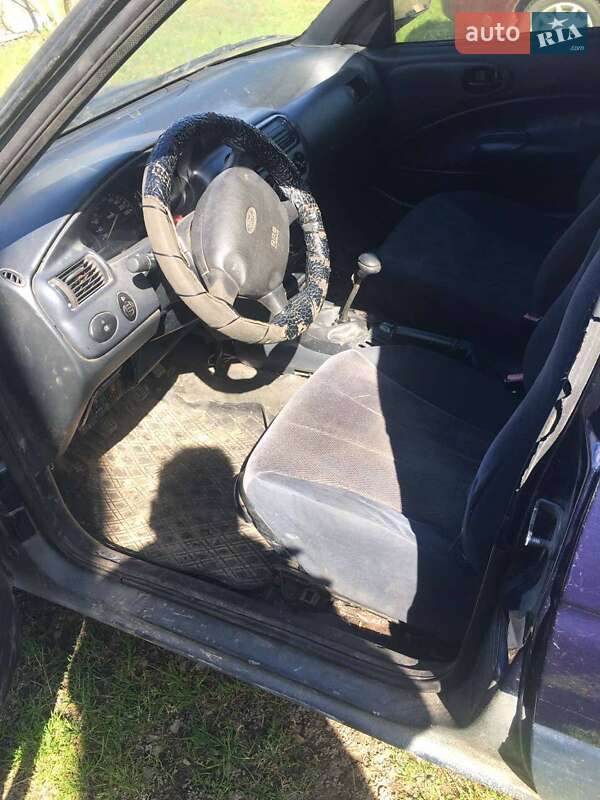 Хэтчбек Ford Escort 1999 в Долине