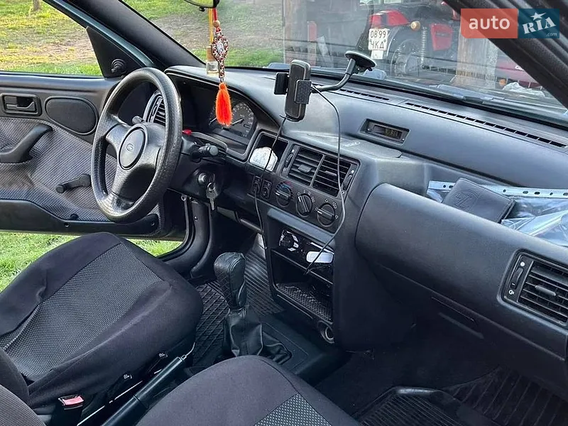 Ford Escort 1992 VIN WF0AXXGCAANE11719 фото оголошення 5 з 43