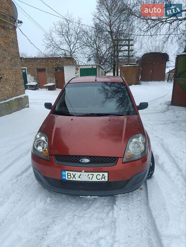 2007 Ford Fiesta, VIN WF0HXXGAJH7Y28982:plate — фото 1 (autoria)