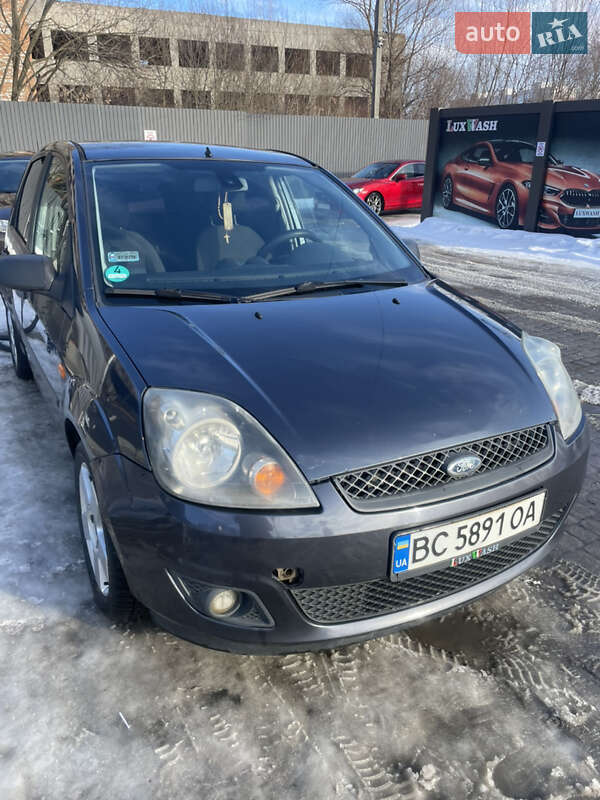 2006 Ford Fiesta, VIN WF0HXXGAJH6P03126:plate — фото 1 (autoria)