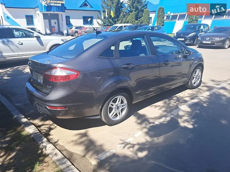 Ford Fiesta 2017 VIN 3FADP4BJXHM117058 фото оголошення 4 з 55