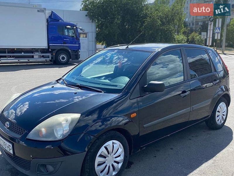 2008 Ford Fiesta, VIN WF0HXXWPJH8L46236:plate — фото 1 (autoria)
