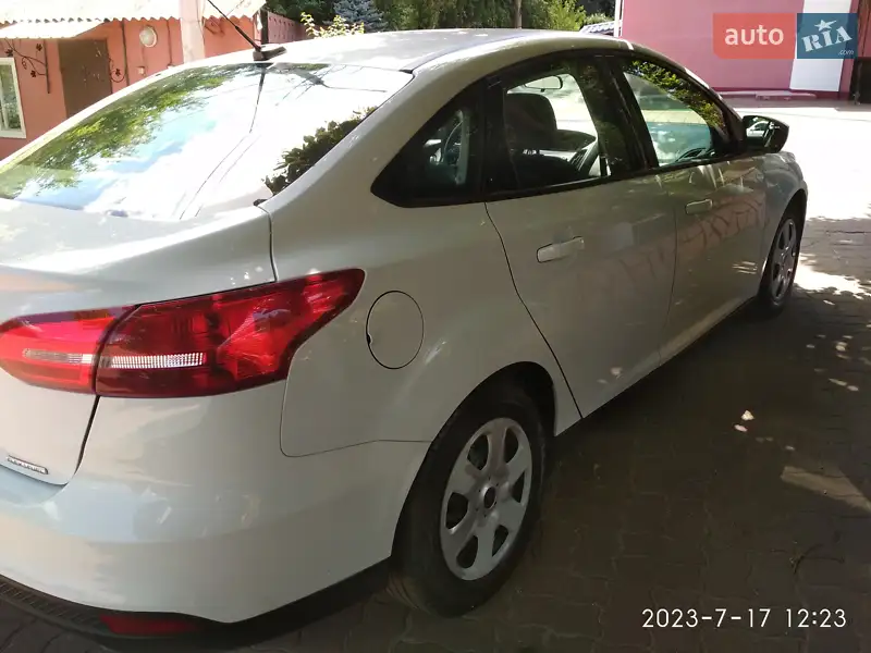 Ford Focus 2016 VIN 1FADP3E27GL294696 фото оголошення 4 з 57