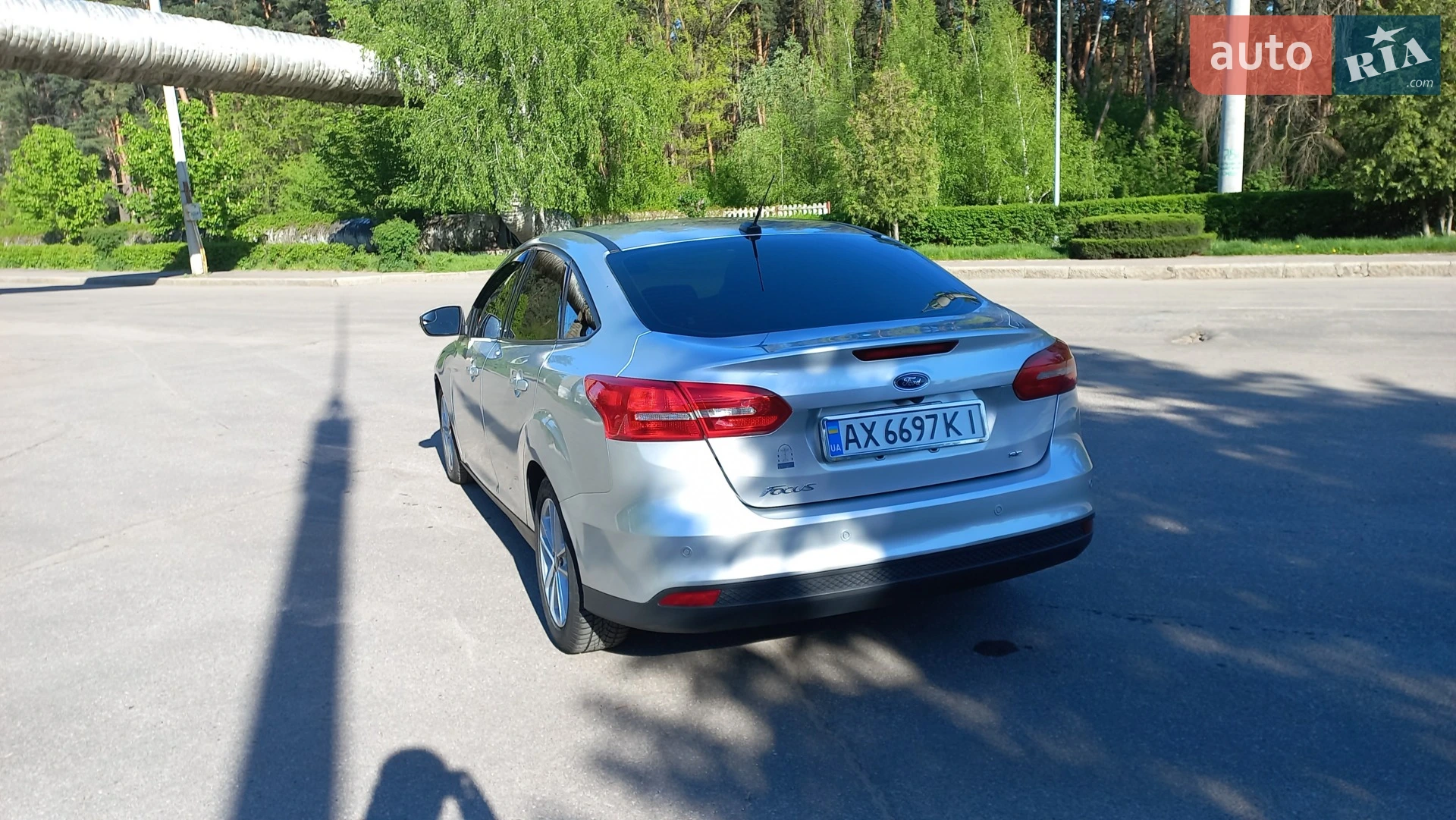 Ford Focus 2015 VIN 1FADP3F22FL371990 фото оголошення 3 з 11