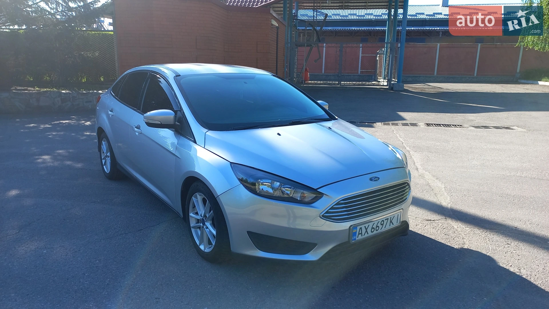 Ford Focus 2015 VIN 1FADP3F22FL371990 фото оголошення 4 з 11