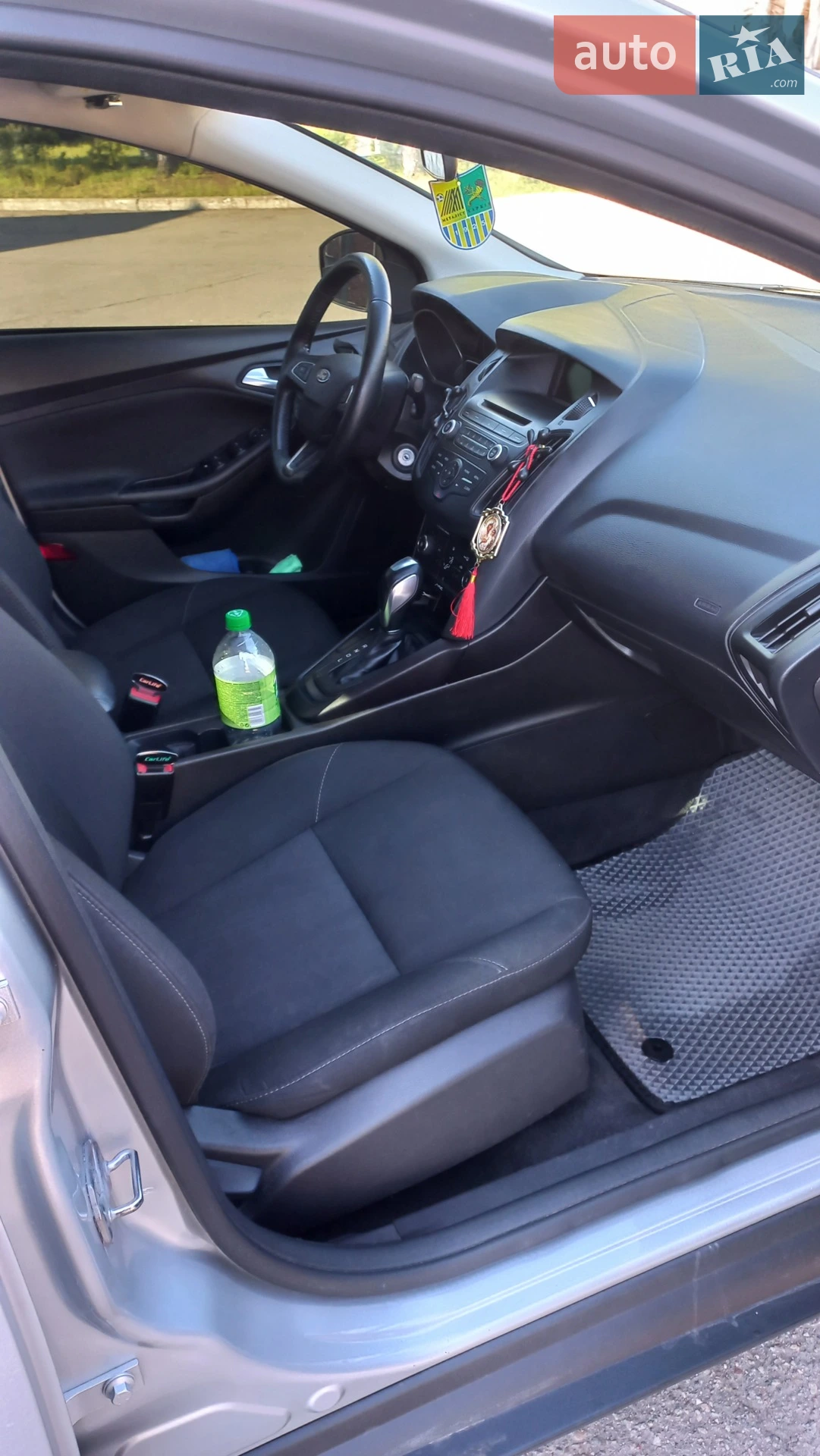 Ford Focus 2015 VIN 1FADP3F22FL371990 фото оголошення 10 з 11