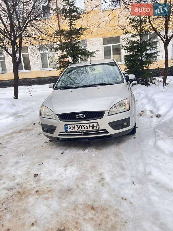 2007 Ford Focus, VIN WF0WXXGCDW7U66002:plate — фото 1 (autoria)