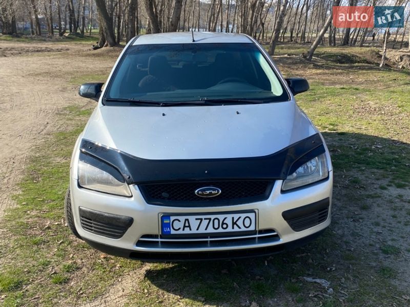 2007 Ford Focus, VIN WF05XXGCD57E65276:plate — фото 1 (autoria)