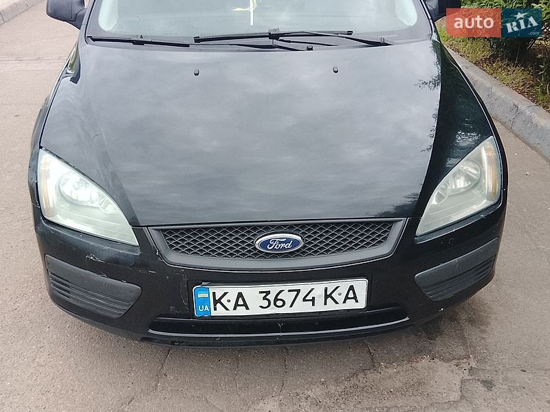 2006 Ford Focus, VIN WF0WXXGCDW6A70506:plate — фото 1 (autoria)