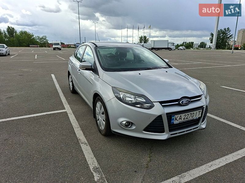 2012 Ford Focus, VIN WF0MXXGCBMCA41111:plate — фото 1 (autoria)