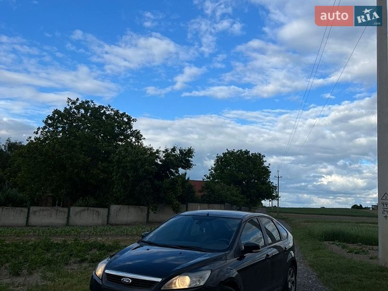 2010 Ford Focus, VIN WF0PXXGCDPAY51083:plate — фото 1 (autoria)