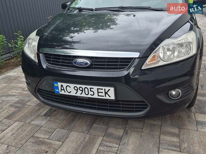 2010 Ford Focus, VIN WF0SXXGCDSAP42988:plate — фото 1 (autoria)