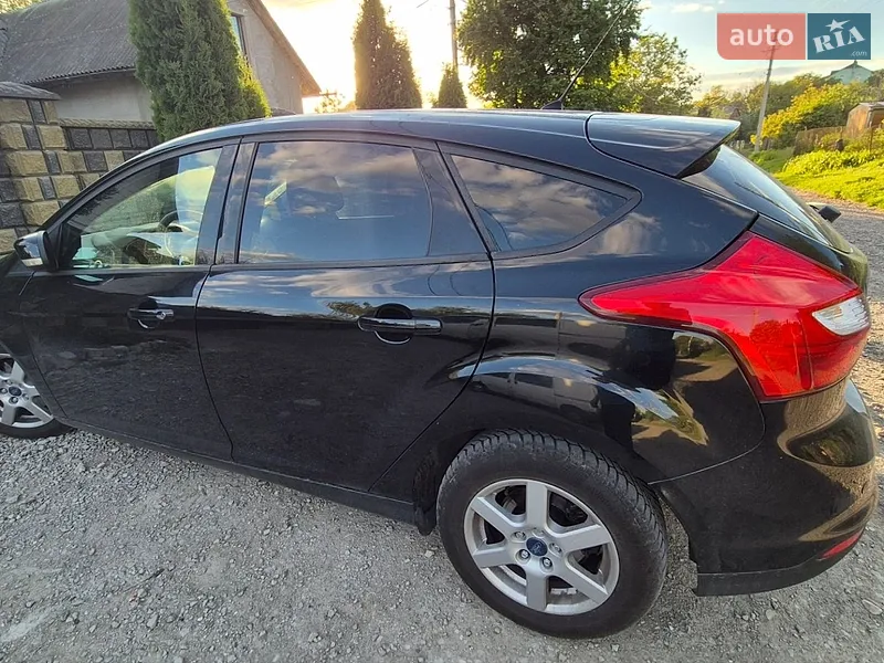 Ford Focus 2011 VIN WF0KXXGCBKBK72615 фото оголошення 2 з 77