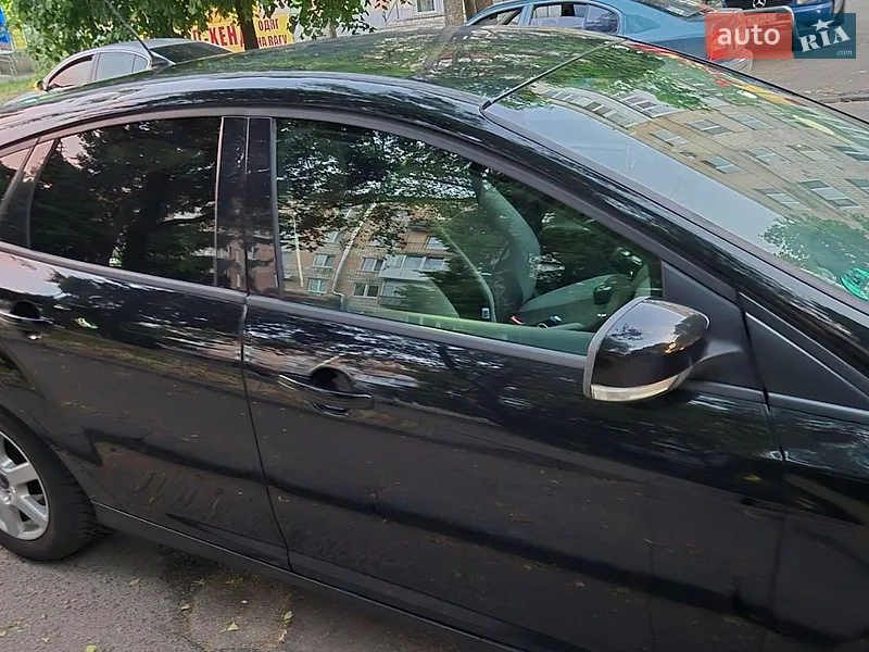 Ford Focus 2011 VIN WF0KXXGCBKBK72615 фото оголошення 12 з 77