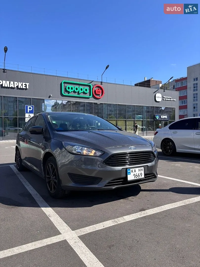Ford Focus 2013 VIN WF0LXXGCBLDM11067 фото оголошення 2 з 21