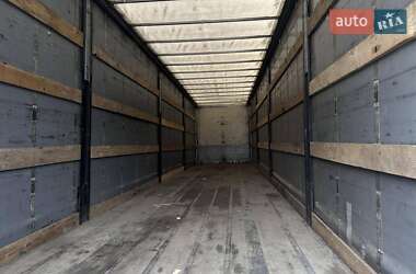 Тентований борт (штора) - напівпричіп Fruehauf TX 34 2009 в Володимирі