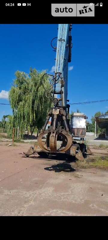 Екскаватор навантажувач Fuchs 714 1992 в 
