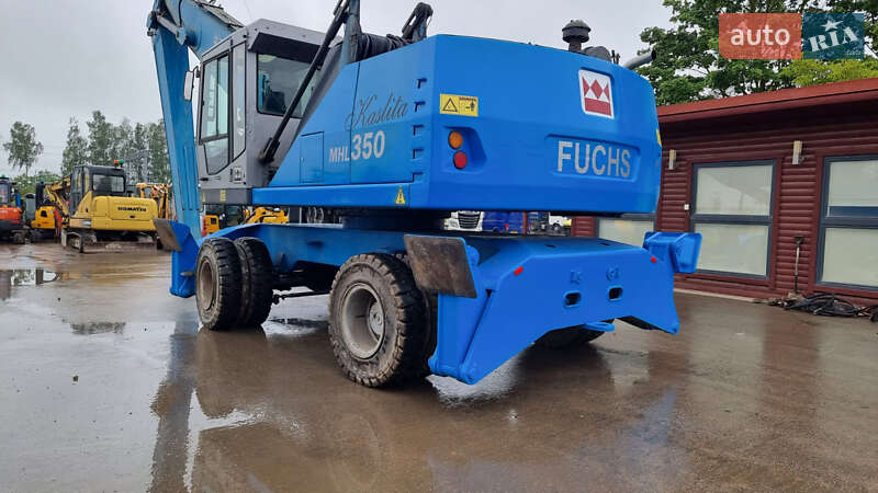 Экскаватор погрузчик Fuchs MHL-350 2010 в 