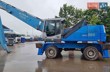 Экскаватор погрузчик Fuchs MHL-350 2010 в 