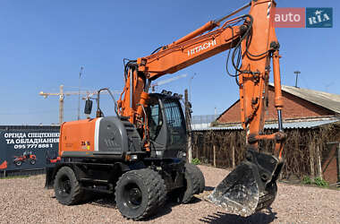 Колесный экскаватор Hitachi ZX 140 2013 в 