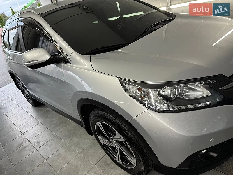 Honda CR-V 2011 VIN SHSRE5850BU011928 фото оголошення 13 з 52
