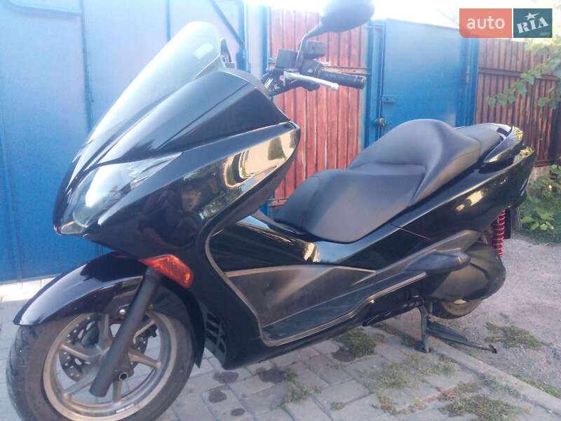 Макси-скутер Honda Forza 250 2010 в Павлограде фото 6 Макси-скутер Honda Forza 250 2010 в Павлограде