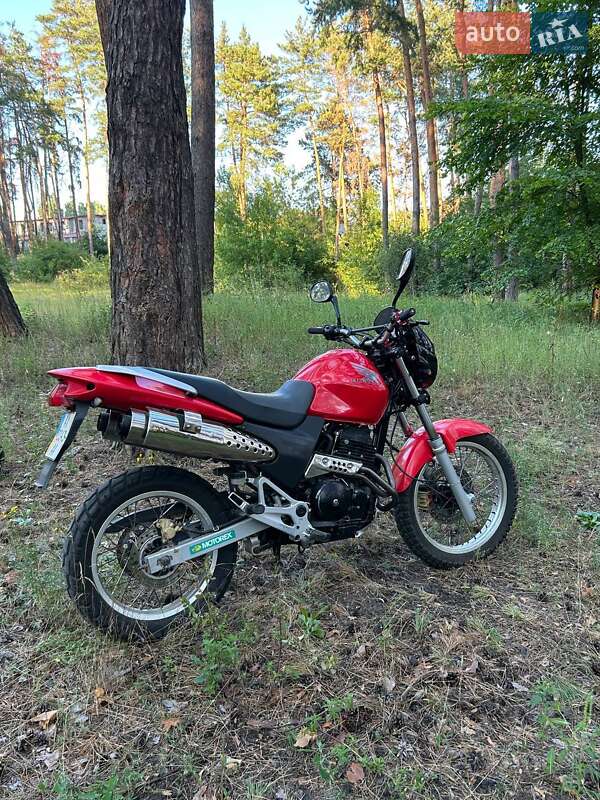 Мотоцикл Многоцелевой (All-round) Honda FX 650 1999 в 