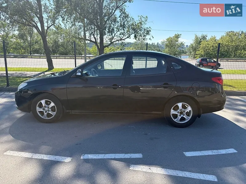 Hyundai Elantra 2010 VIN KMHDU41DBAU111223 фото оголошення 7 з 52
