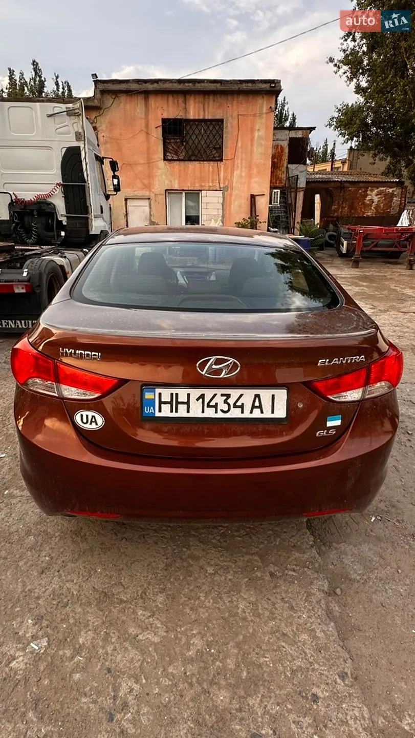 Hyundai Elantra 2013 VIN KMHDH41CADU691868 фото оголошення 2 з 26