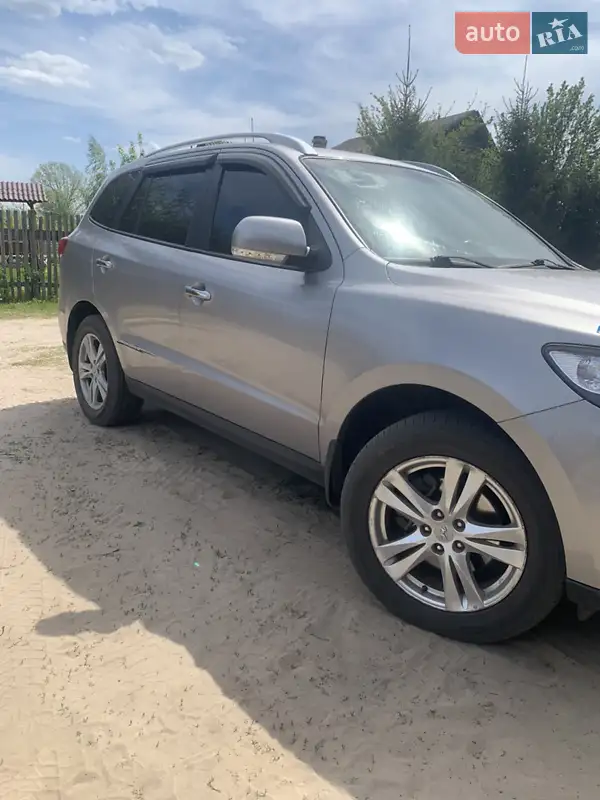 Hyundai Santa FE 2011 VIN KMHSH81XDBU703627 фото оголошення 2 з 51