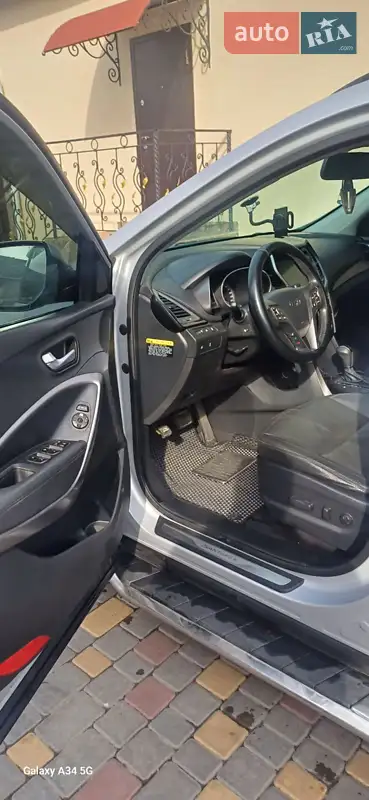 Hyundai Santa FE 2014 VIN KMHSW81UDFU329324 фото оголошення 7 з 53
