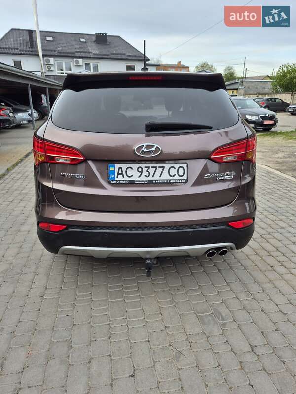Внедорожник / Кроссовер Hyundai Santa FE 2014 в Нововолынске