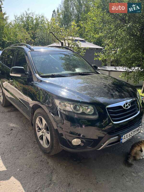 Внедорожник / Кроссовер Hyundai Santa FE 2012 в 
