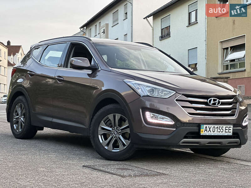 Внедорожник / Кроссовер Hyundai Santa FE 2014 в 