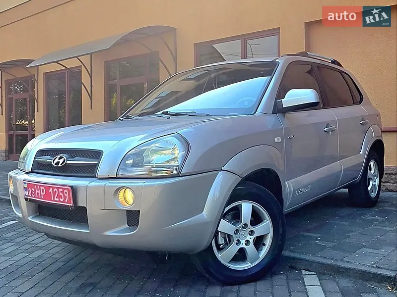 Hyundai Tucson 2005 VIN KMHJN81VP5U233596 фото оголошення 2 з 70