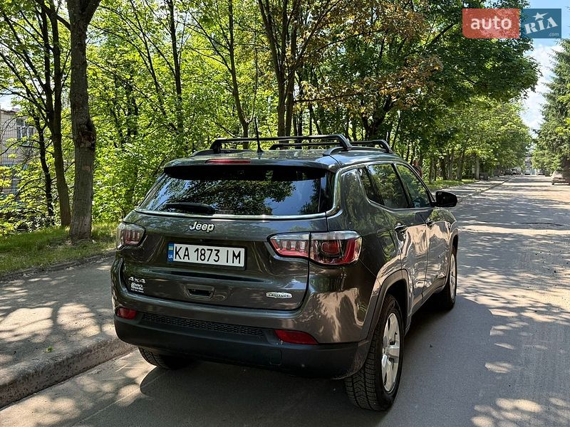 2018 Jeep Compass, VIN 3C4NJDBB0JT484040:plate — photo 1 (autoria)