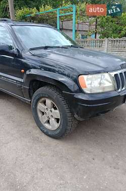 Внедорожник / Кроссовер Jeep Grand Cherokee 2000 в 