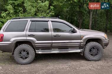 Внедорожник / Кроссовер Jeep Grand Cherokee 1999 в 