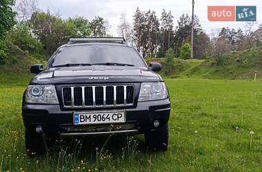 Внедорожник / Кроссовер Jeep Grand Cherokee 2004 в 