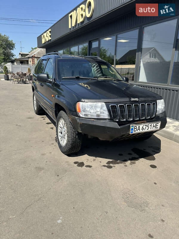 Внедорожник / Кроссовер Jeep Grand Cherokee 2002 в 