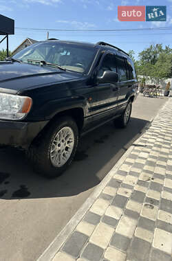 Внедорожник / Кроссовер Jeep Grand Cherokee 2002 в 
