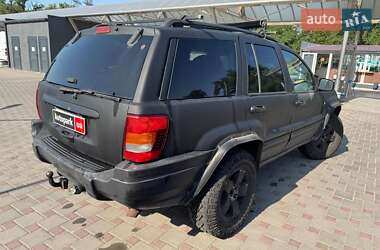 Внедорожник / Кроссовер Jeep Grand Cherokee 2002 в 