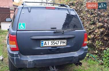 Внедорожник / Кроссовер Jeep Grand Cherokee 2000 в 