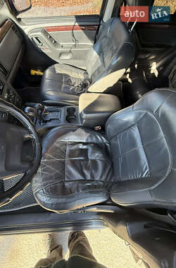 Внедорожник / Кроссовер Jeep Grand Cherokee 2004 в 