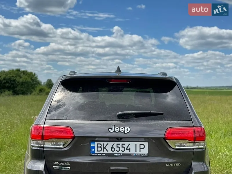 Jeep Grand Cherokee 2014 VIN 1C4RJFBM9EC399424 фото оголошення 4 з 57